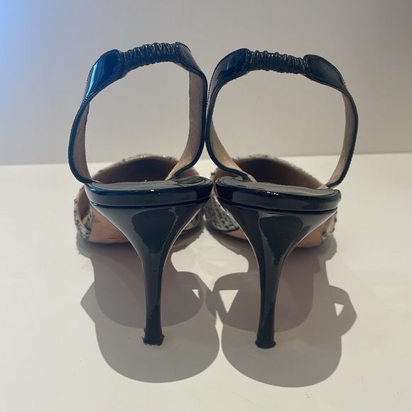 Manolo Blahnik
Tweed Pattern Slingback Pumps
Size: 40 1/2 - Picture 4 of 6